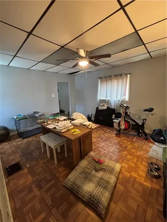 a living room with a couch and a table