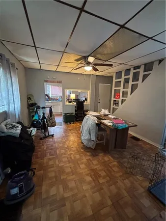 a view of a chairs and table in a room