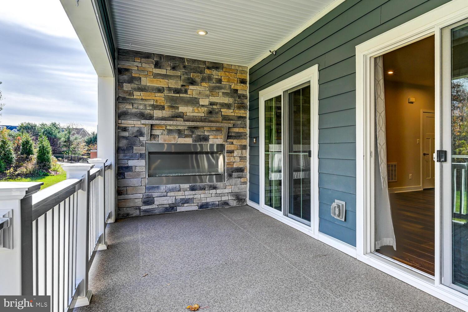 10866 Beckenham Street Baltimore, MD 21220 - Photo 10 of 45 Porch with gas fireplace