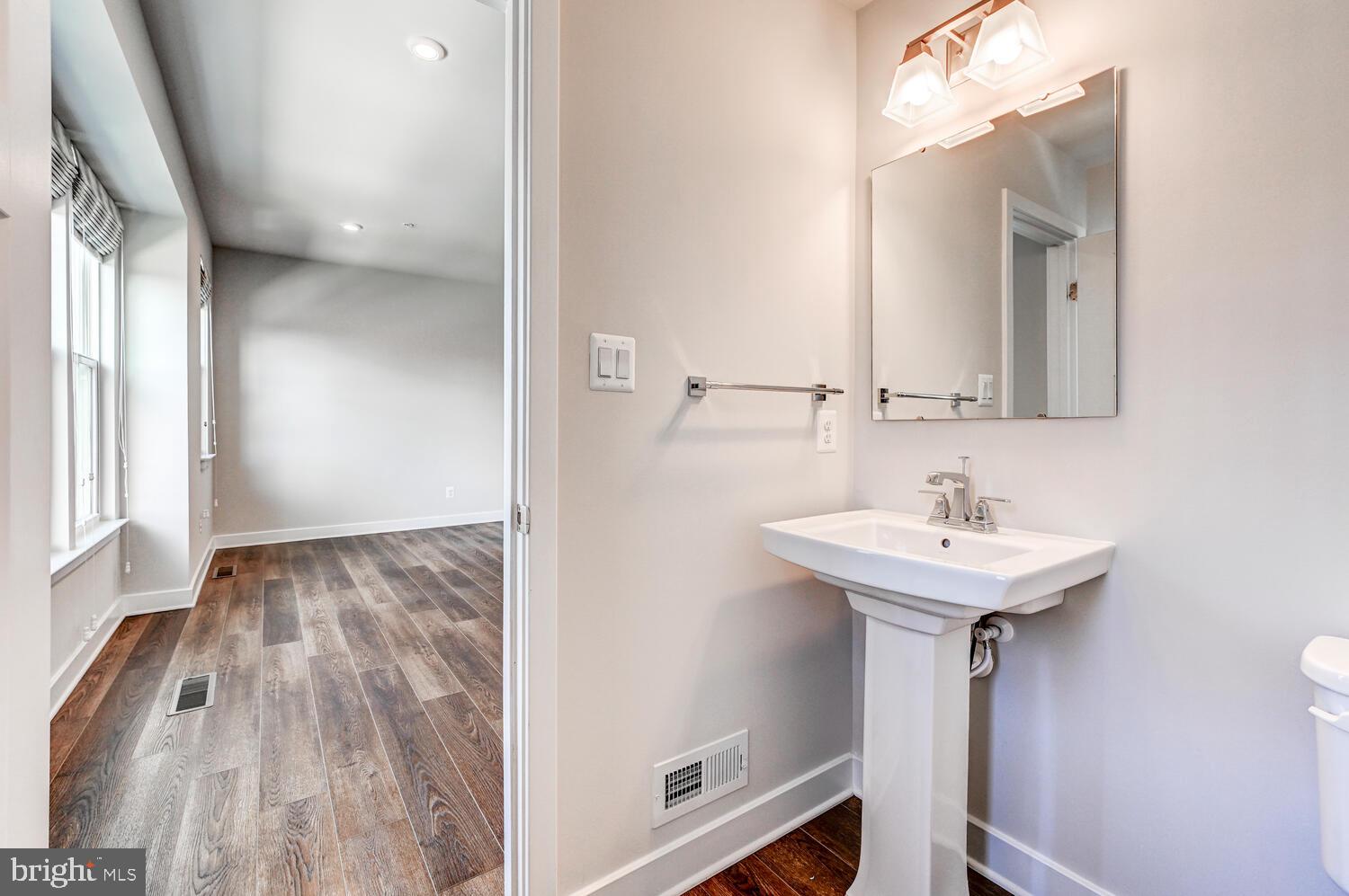 10866 Beckenham Street Baltimore, MD 21220 - Photo 13 of 45 Half bath on LR level