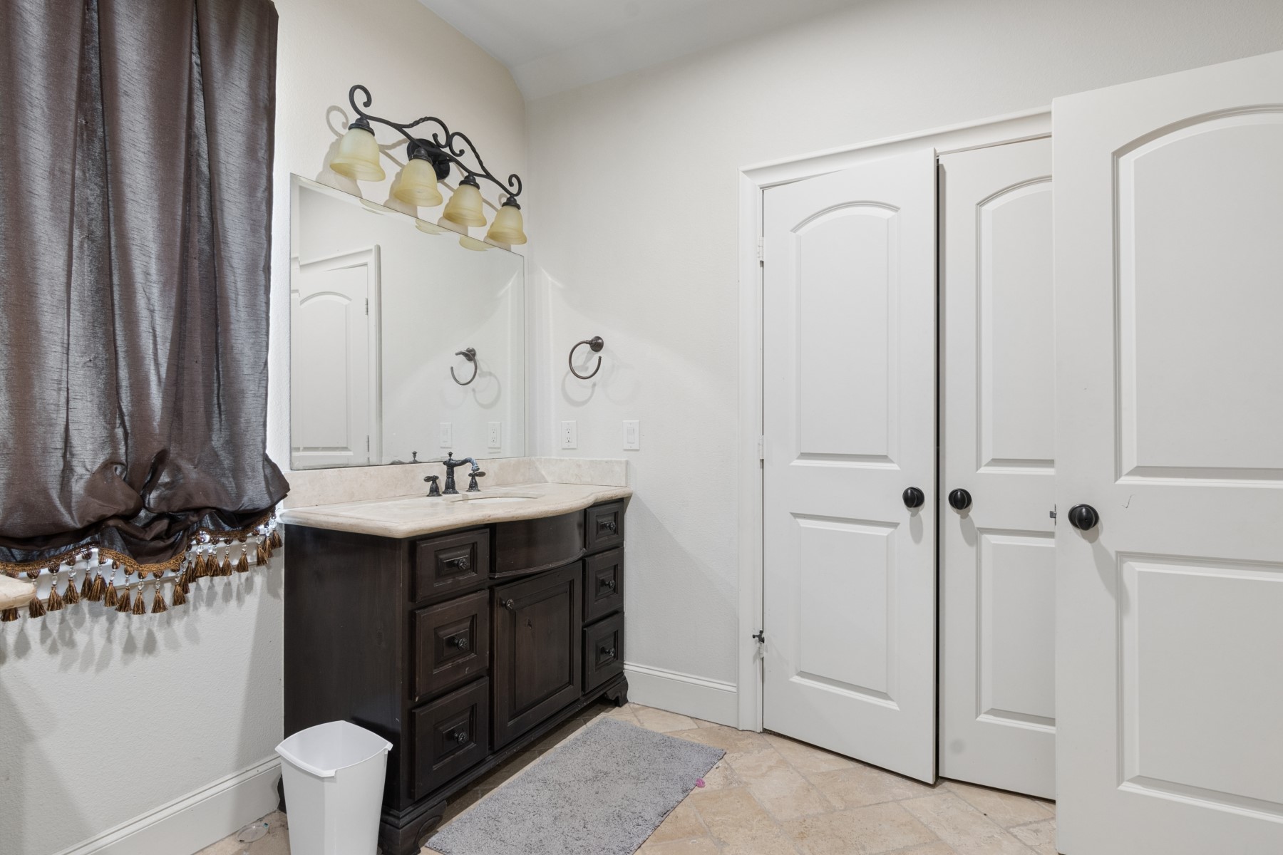 3818 Waterbend Cove Spring, TX 77386 - Photo 32 of 44 a bathroom with a double vanity sink mirror and