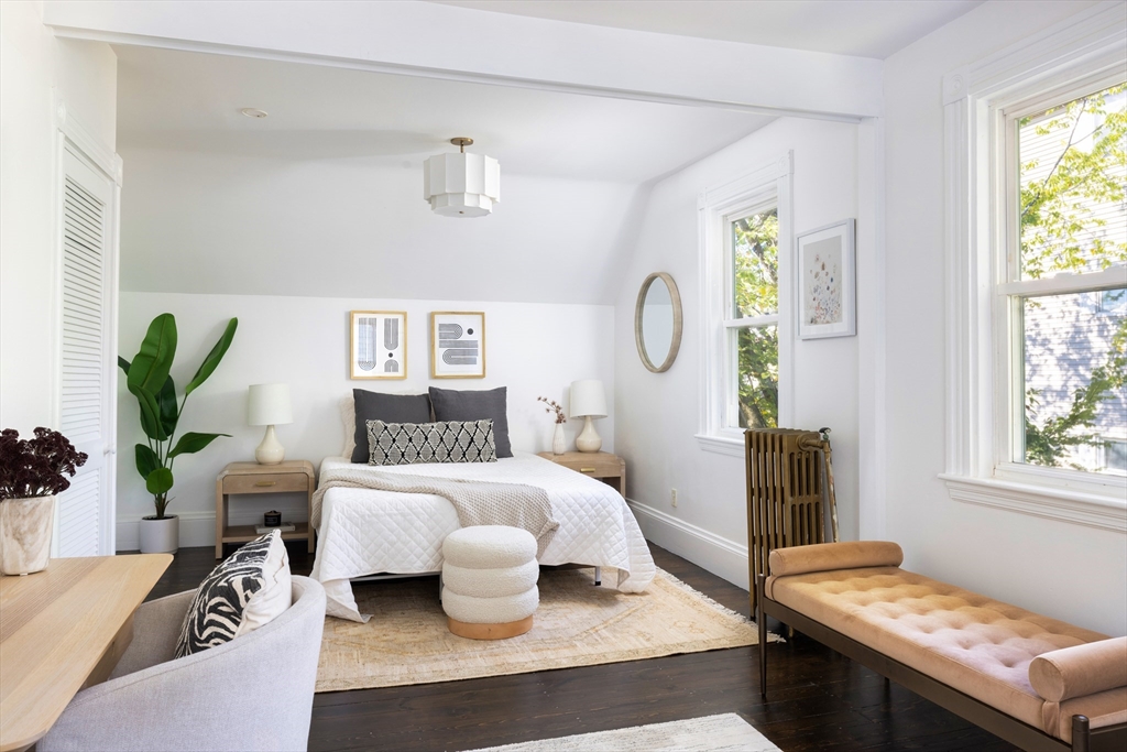 9 Carver Street Somerville, MA 02143 - Photo 9 of 11 a living room with furniture and a window