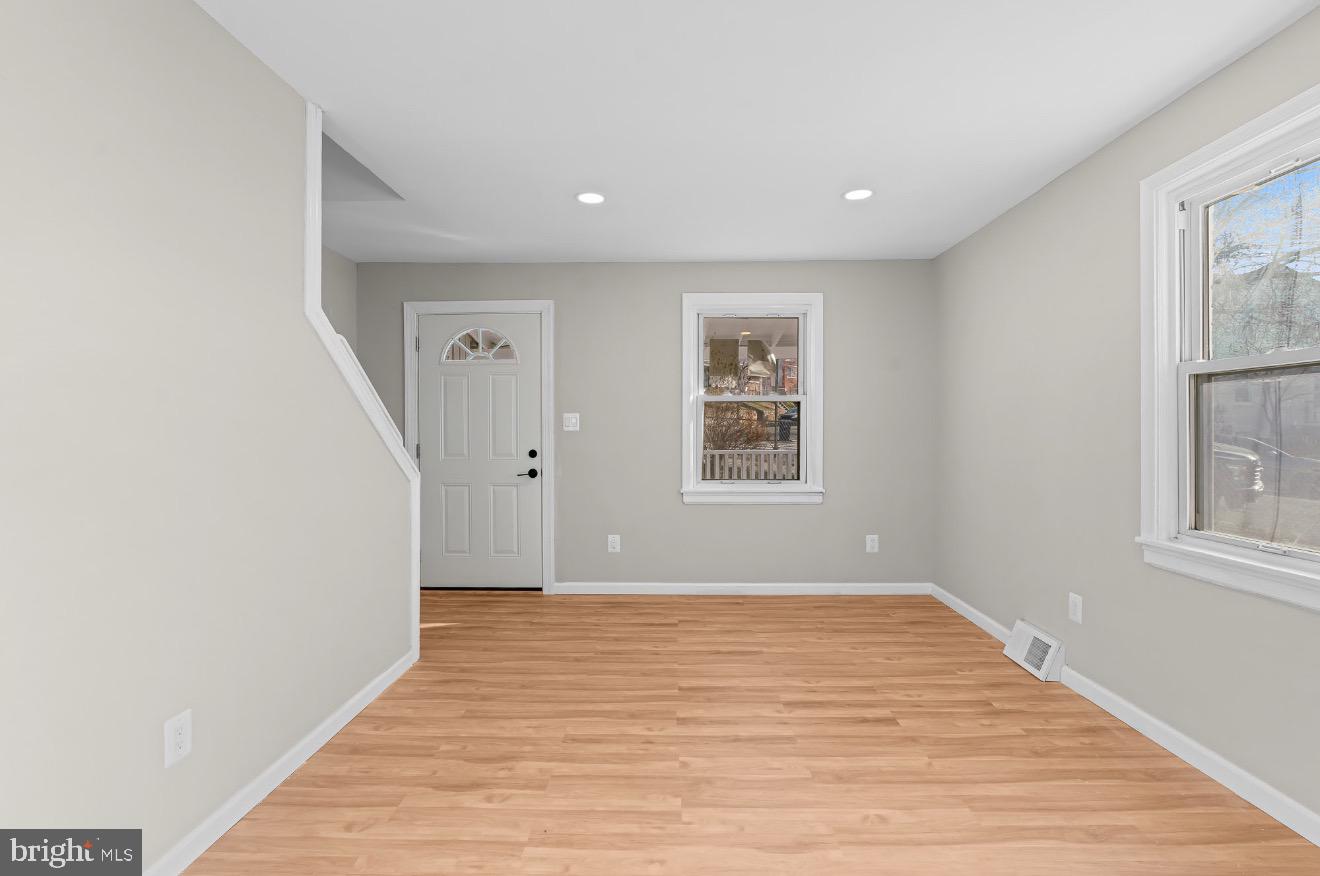 852 50th Place Northeast Washington, DC 20019 - Photo 10 of 15 Bright and airy entryway with natural light.
