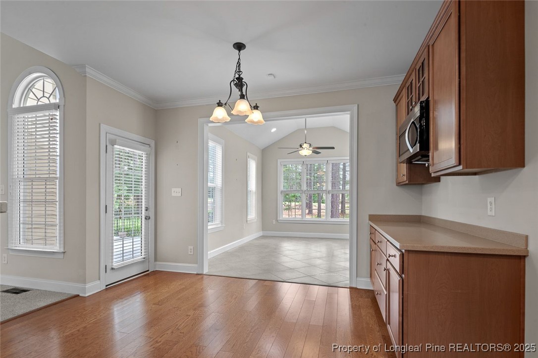 259 Rolling Pines Drive Spring Lake, NC 28390 - Photo 24 of 50 a view of an empty room with window and wooden floor