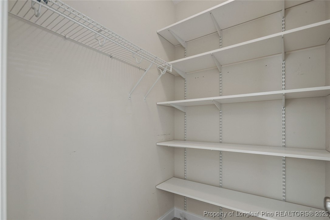 259 Rolling Pines Drive Spring Lake, NC 28390 - Photo 37 of 50 a view of an empty walk in closet