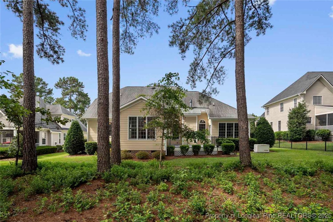 259 Rolling Pines Drive Spring Lake, NC 28390 - Photo 50 of 50 a front view of a house with garden