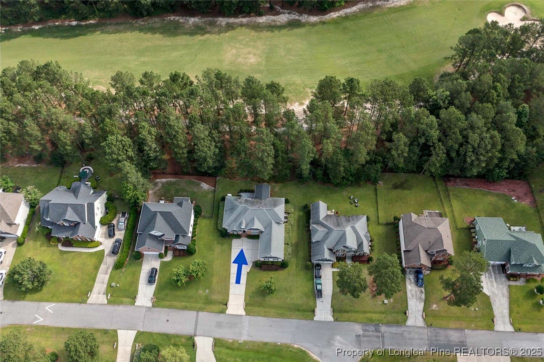 259 Rolling Pines Drive Spring Lake, NC 28390 - Photo 6 of 50 an aerial view of a house with swimming pool outdoor seating and yard