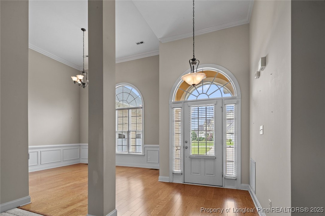 259 Rolling Pines Drive Spring Lake, NC 28390 - Photo 8 of 50 a view of an entryway with wooden floor