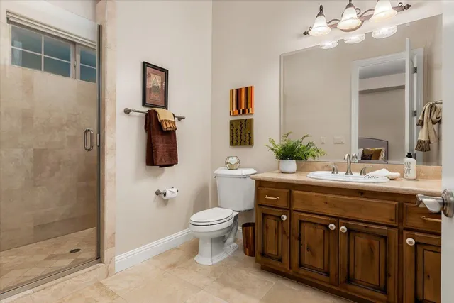 a kitchen with stainless steel appliances granite countertop a refrigerator and cabinets