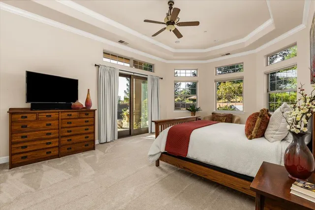 a bathroom with a tub sink and window