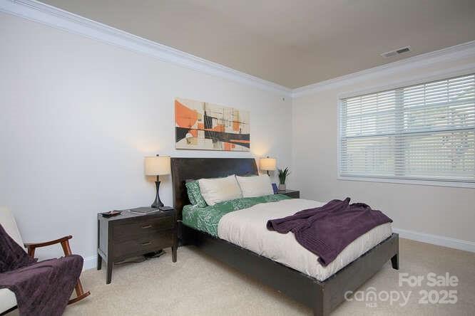 4245 Millstream Road Denver, NC 28037 - Photo 22 of 47 a bedroom with a bed and window