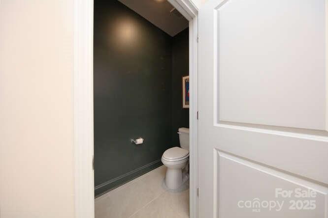 4245 Millstream Road Denver, NC 28037 - Photo 28 of 47 a bathroom with a toilet and a shower