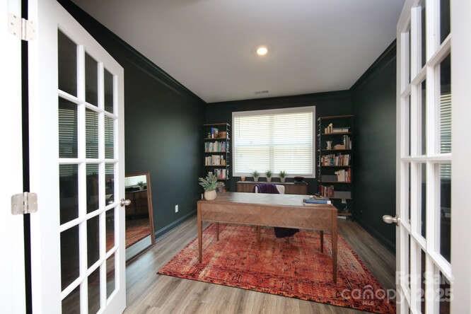 4245 Millstream Road Denver, NC 28037 - Photo 30 of 47 a living room with furniture windows and wooden floor