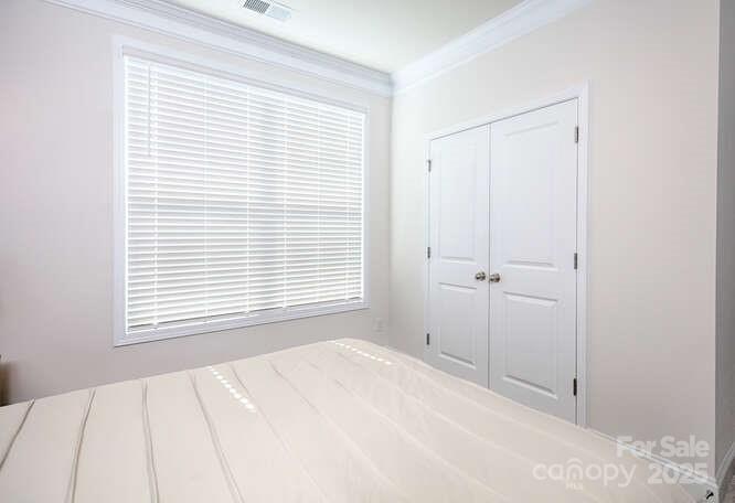 4245 Millstream Road Denver, NC 28037 - Photo 32 of 47 a view of a room that has a window in it