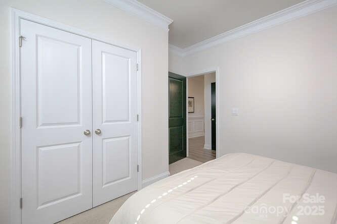 4245 Millstream Road Denver, NC 28037 - Photo 33 of 47 a view of a closet in a bedroom