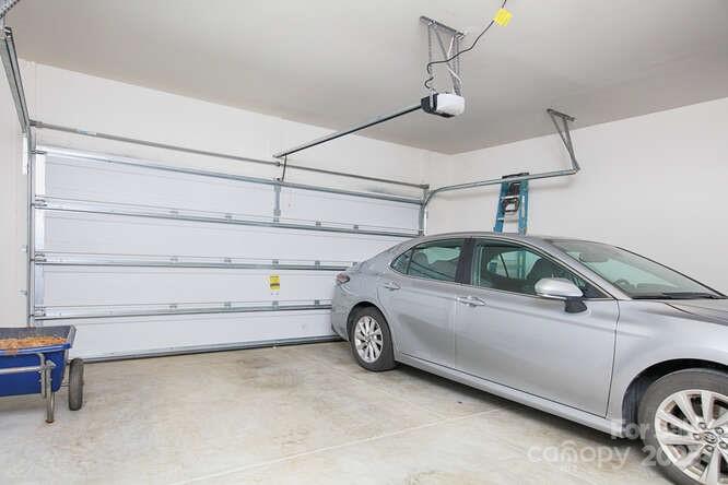 4245 Millstream Road Denver, NC 28037 - Photo 42 of 47 a view of parking garage with cars