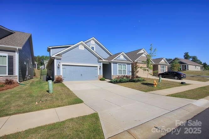 4245 Millstream Road Denver, NC 28037 - Photo 47 of 47 a front view of a house with yard