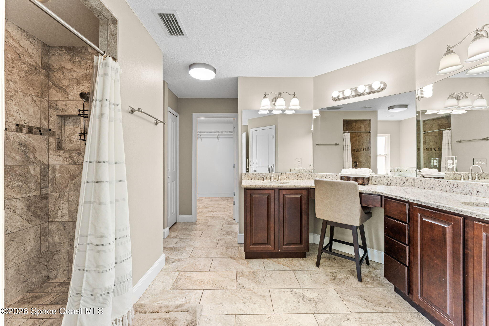 1695 Arch Road Mims, FL 32754 - Photo 26 of 57 a kitchen with a sink and chairs