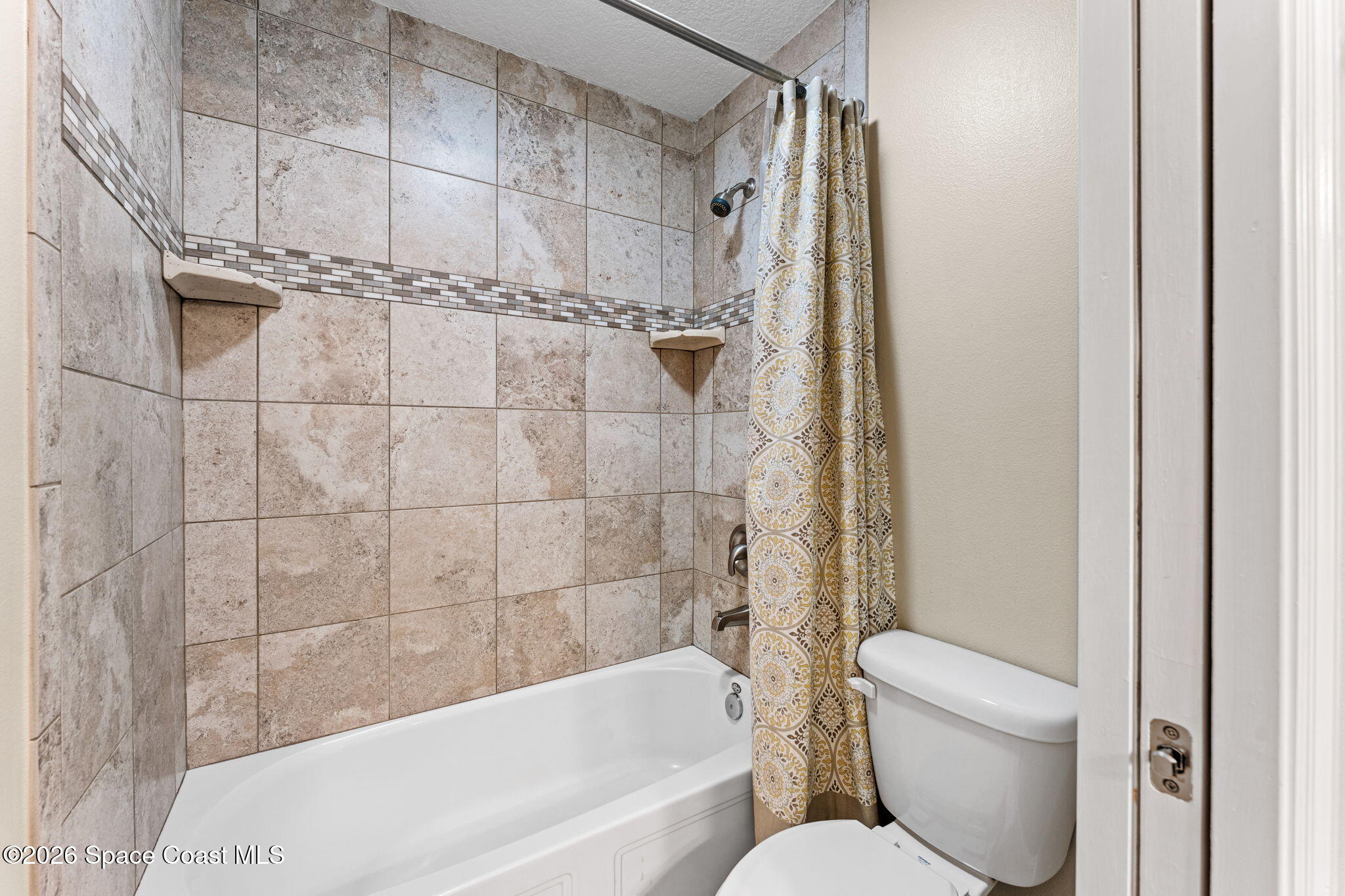 1695 Arch Road Mims, FL 32754 - Photo 34 of 57 a bathroom with a toilet and shower