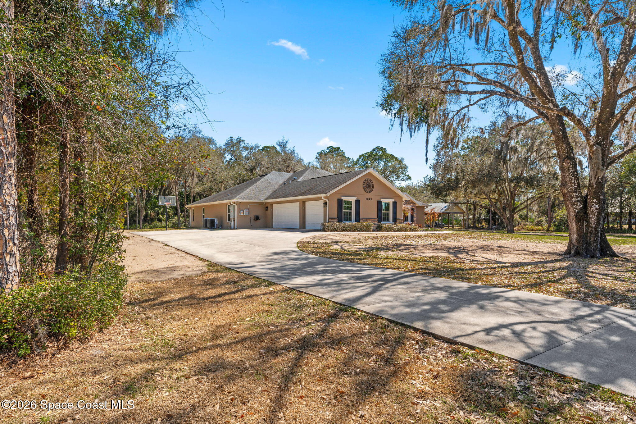 1695 Arch Road Mims, FL 32754 - Photo 45 of 57 driveway