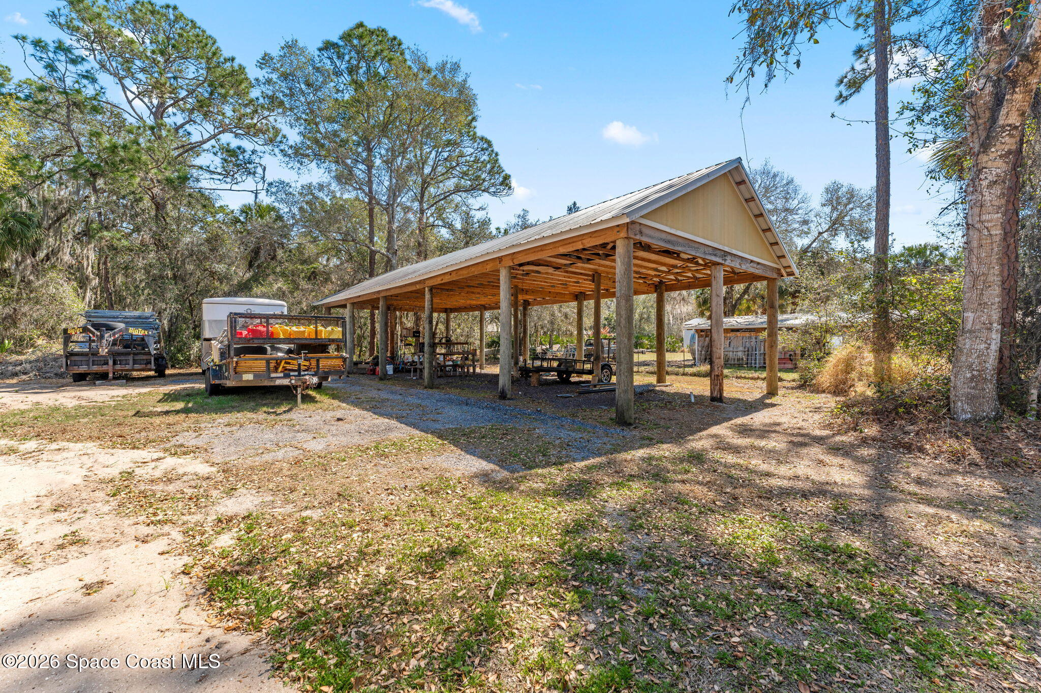 1695 Arch Road Mims, FL 32754 - Photo 46 of 57 1500sqft 5 bay pole barn