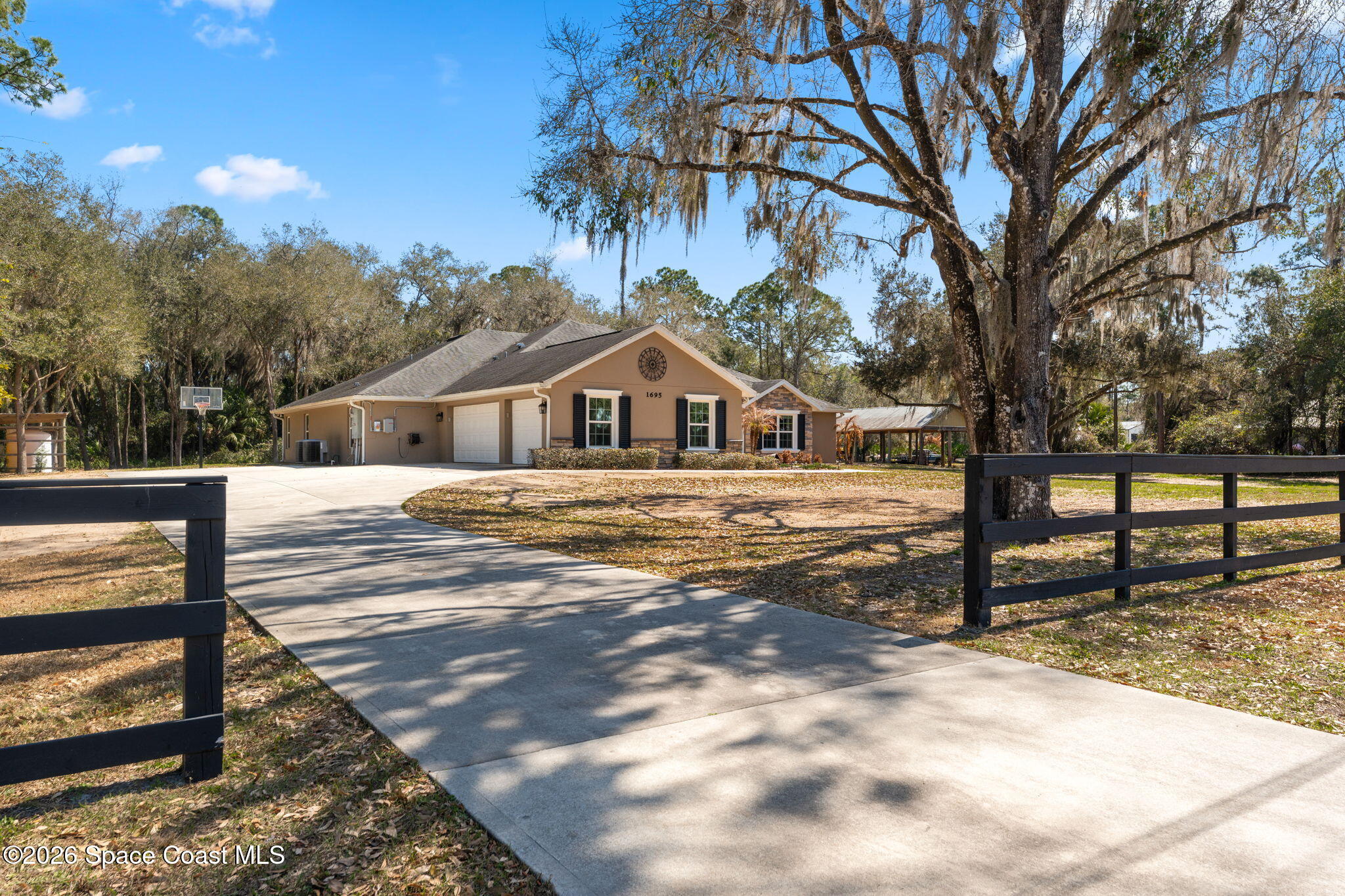 1695 Arch Road Mims, FL 32754 - Photo 5 of 57 driveway