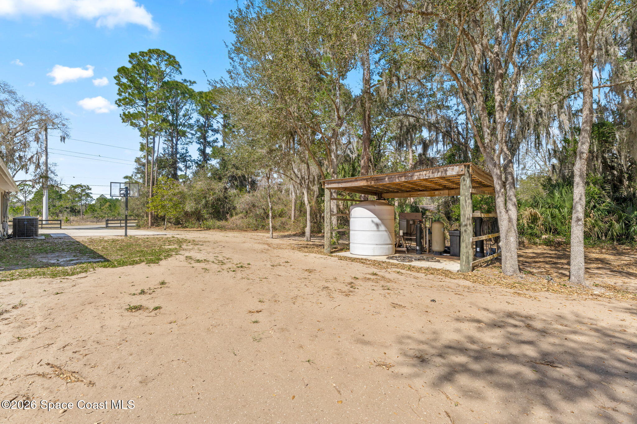 1695 Arch Road Mims, FL 32754 - Photo 50 of 57 a view of a yard with large trees