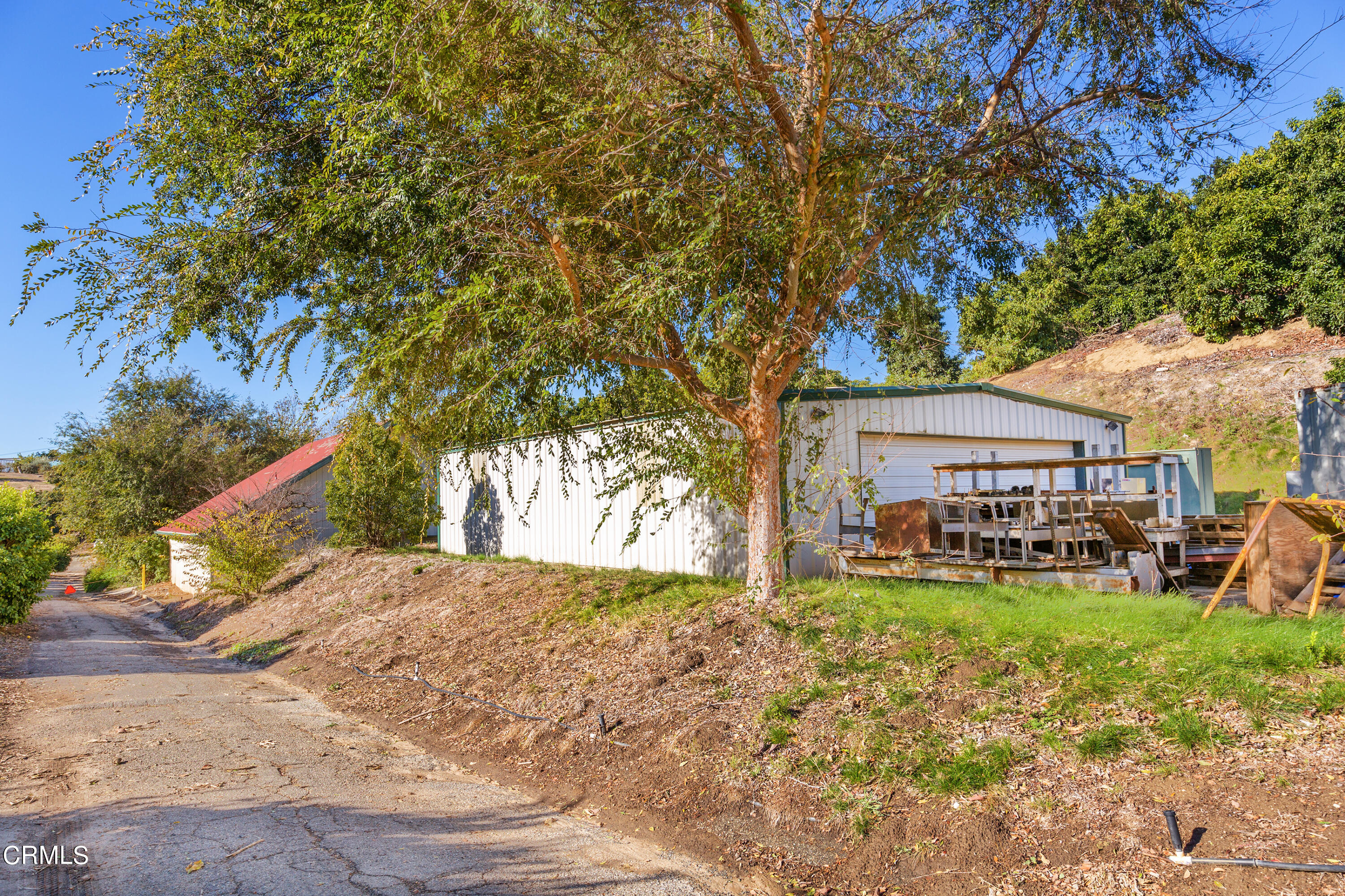 6500 Chagall Drive Moorpark, CA 93021 - Photo 3 of 40 a view of a house with a yard porch and sitting area