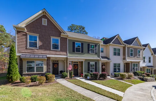 a front view of multiple houses