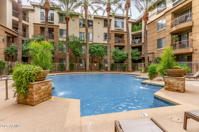 a view of a building with potted plants