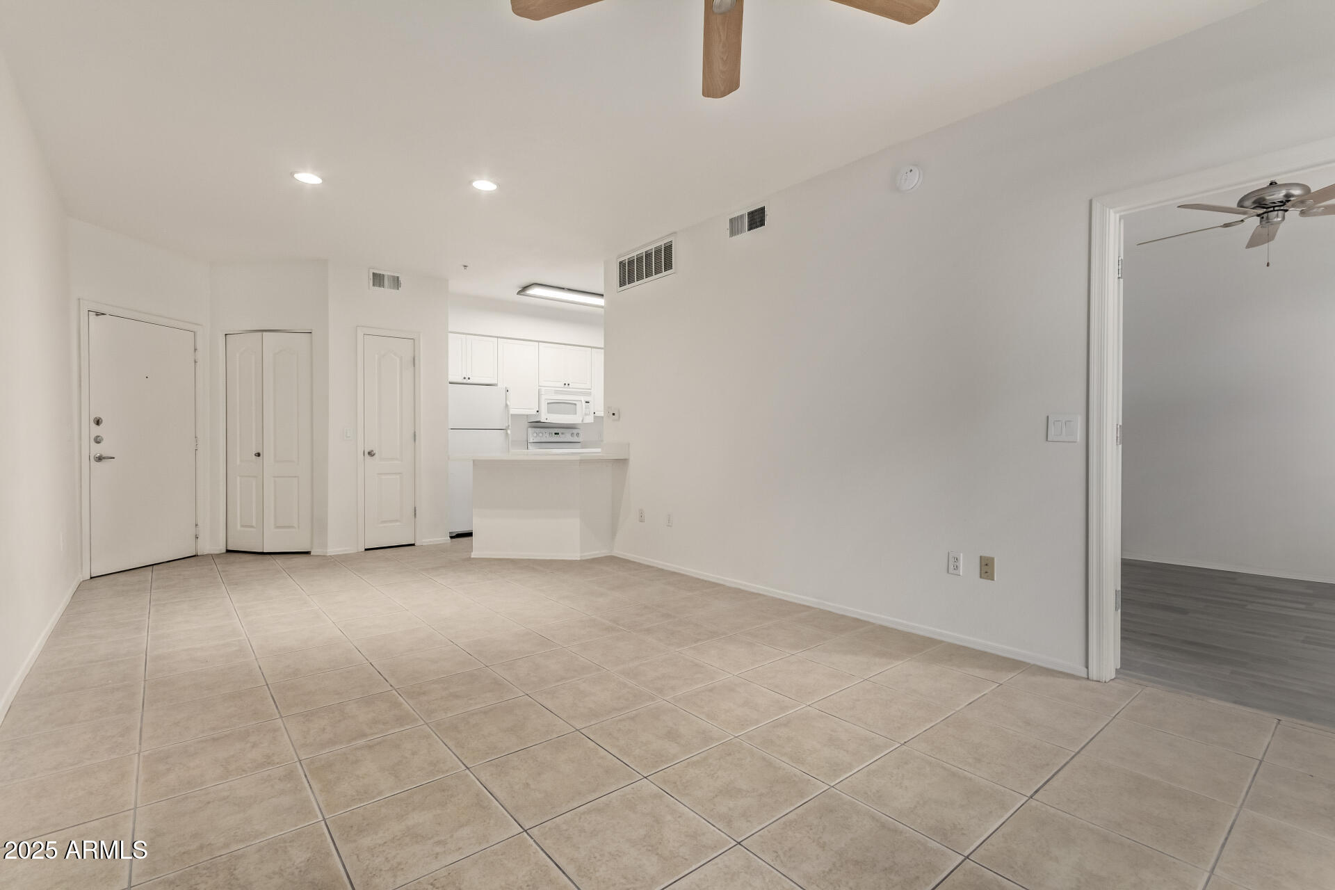1701 East Colter Street, Unit 191 Phoenix, AZ 85016 - Photo 14 of 32 a view of a kitchen with a dishwasher and a refrigerator