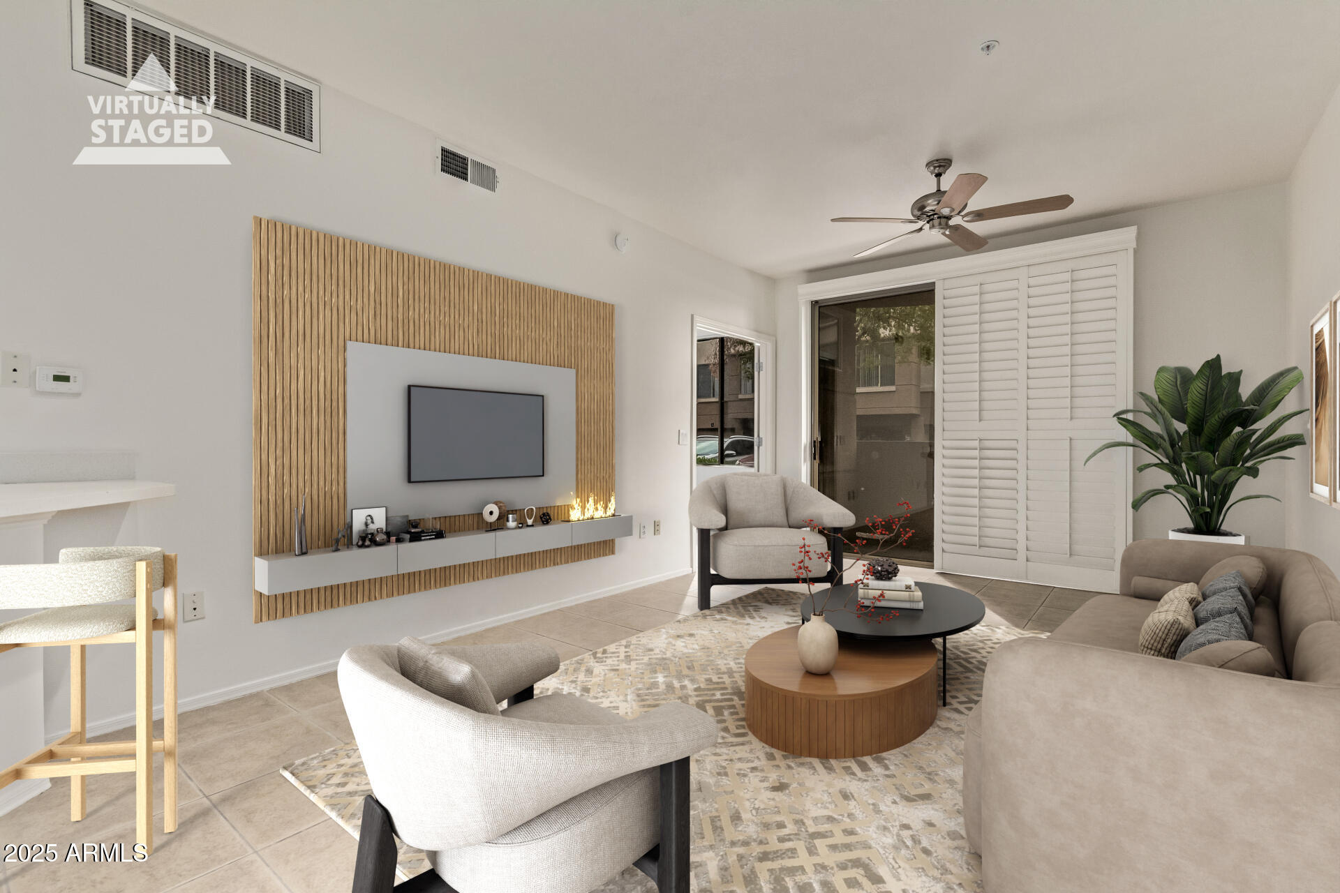 1701 East Colter Street, Unit 191 Phoenix, AZ 85016 - Photo 2 of 33 a living room with furniture and a flat screen tv