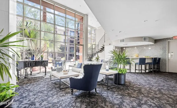 a view of a dining room with furniture window and outside view