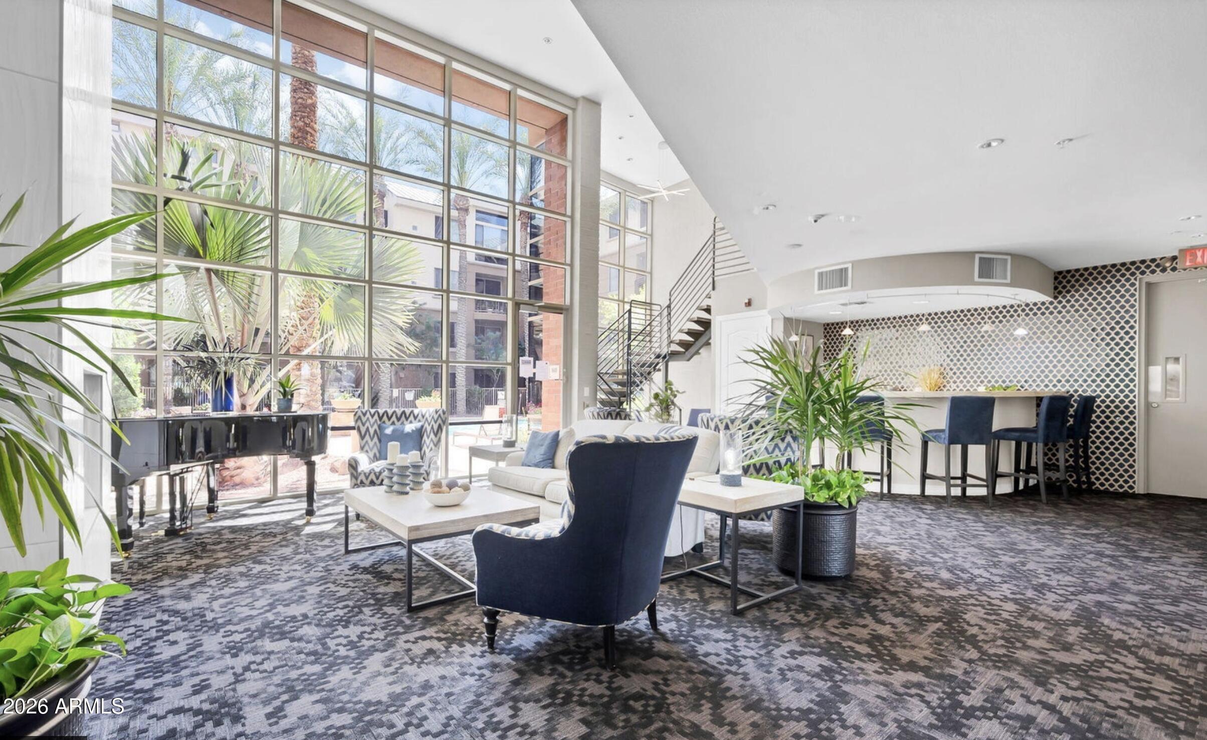1701 East Colter Street, Unit 191 Phoenix, AZ 85016 - Photo 24 of 32 a view of a dining room with furniture window and outside view