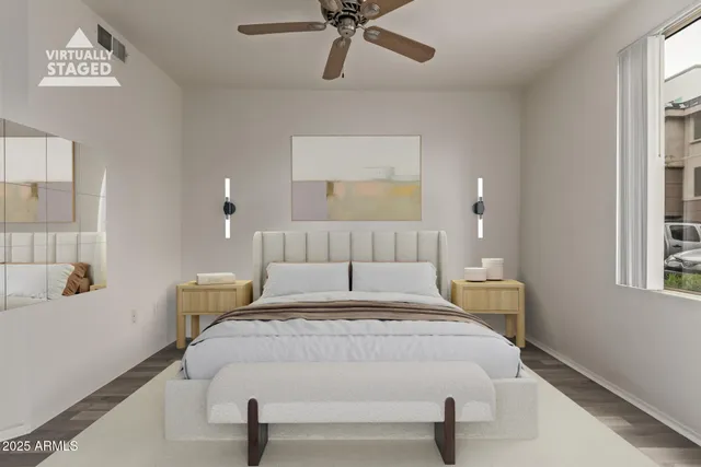 a bedroom with a bed and window