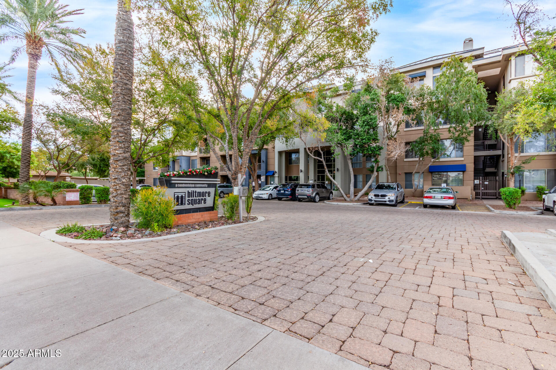 1701 East Colter Street, Unit 191 Phoenix, AZ 85016 - Photo 5 of 33 a view of road with parked cars