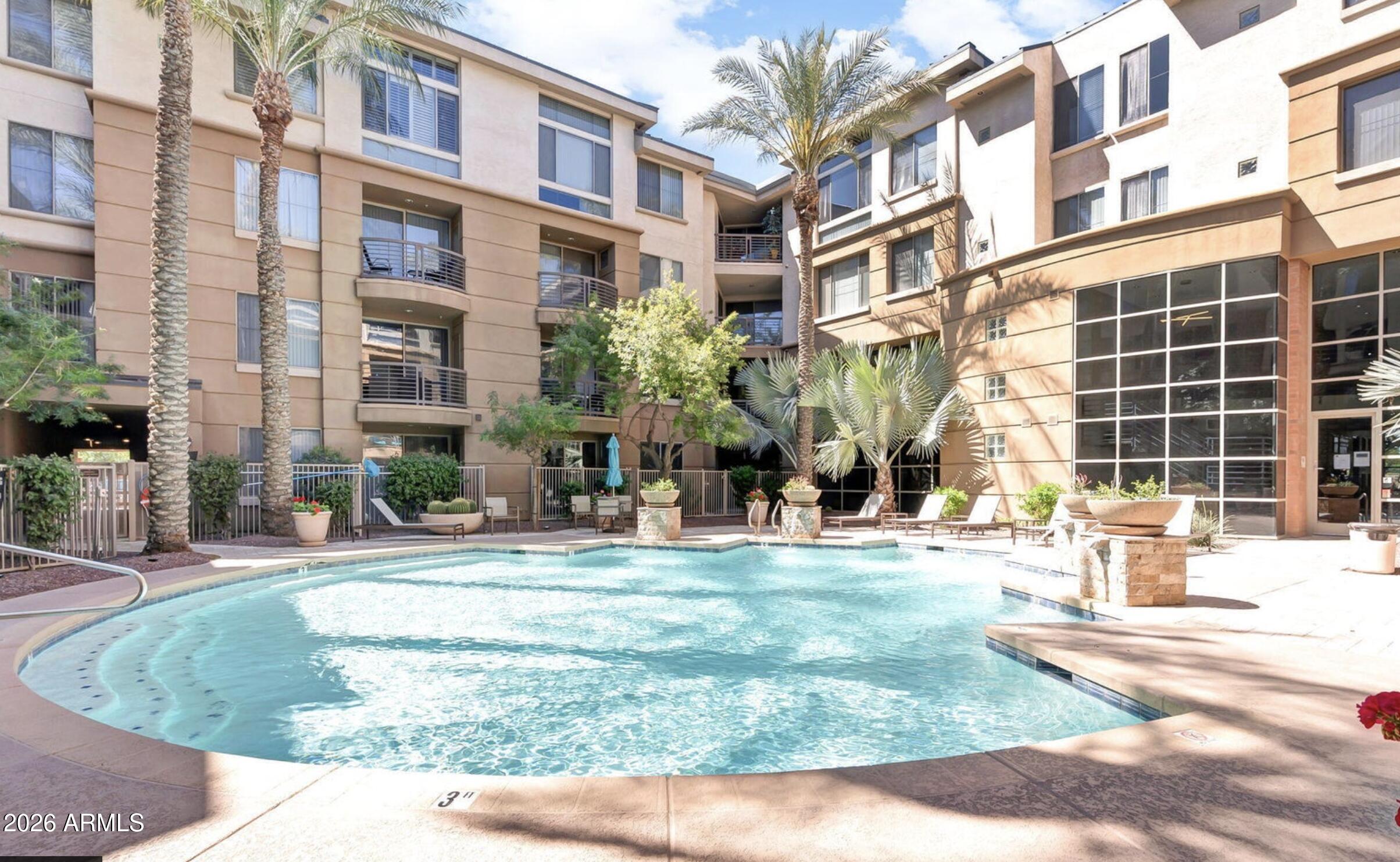 1701 East Colter Street, Unit 191 Phoenix, AZ 85016 - Photo 6 of 32 a view of a building with a yard
