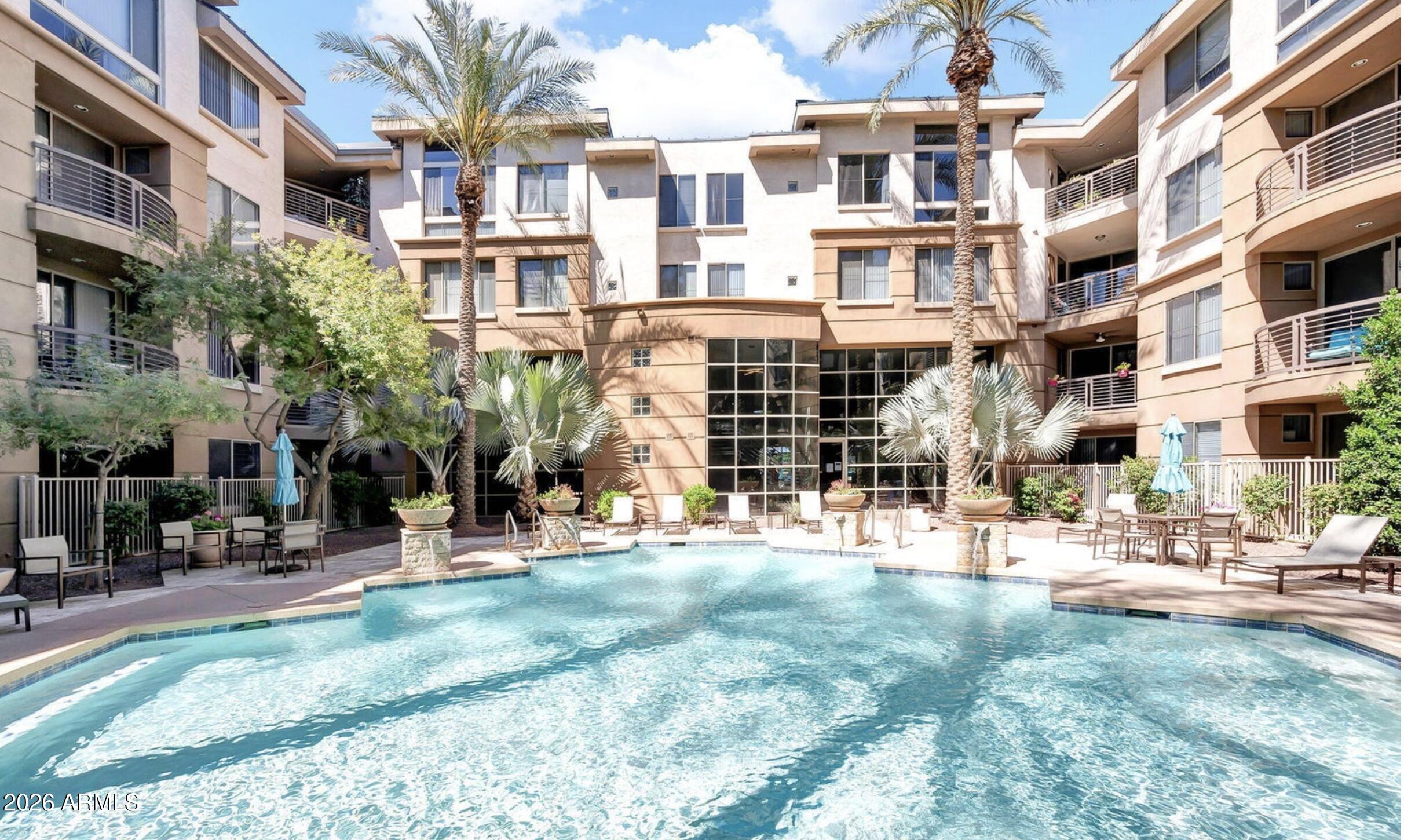 1701 East Colter Street, Unit 191 Phoenix, AZ 85016 - Photo 7 of 32 a view of a building with a yard