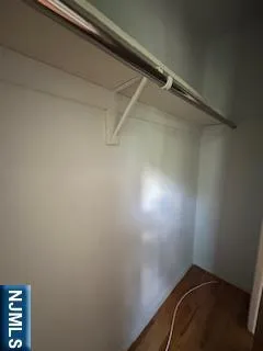 a view of a room with racks on the wall