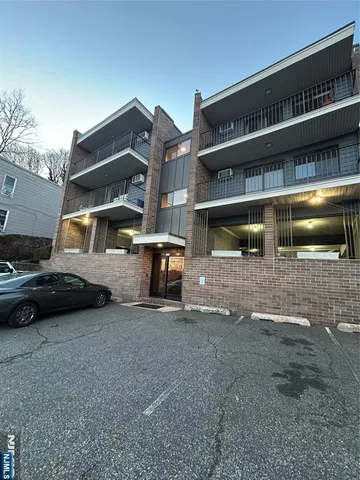 a car parked in front of a building