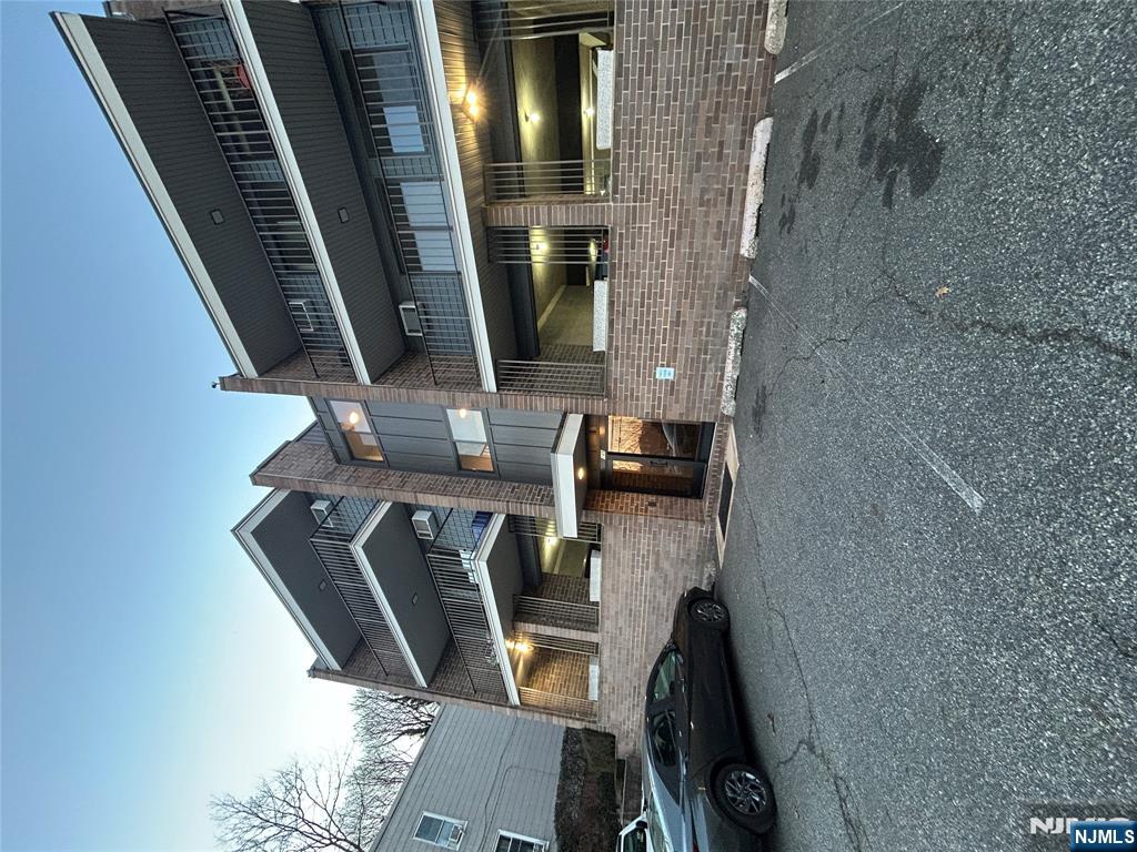 148 Undercliff Avenue, Unit 2 Edgewater, NJ 07020 - Photo 2 of 13 a car parked in front of a building
