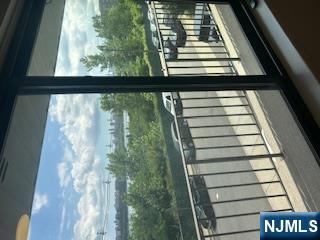 148 Undercliff Avenue, Unit 2 Edgewater, NJ 07020 - Photo 6 of 13 a view of a balcony with furniture