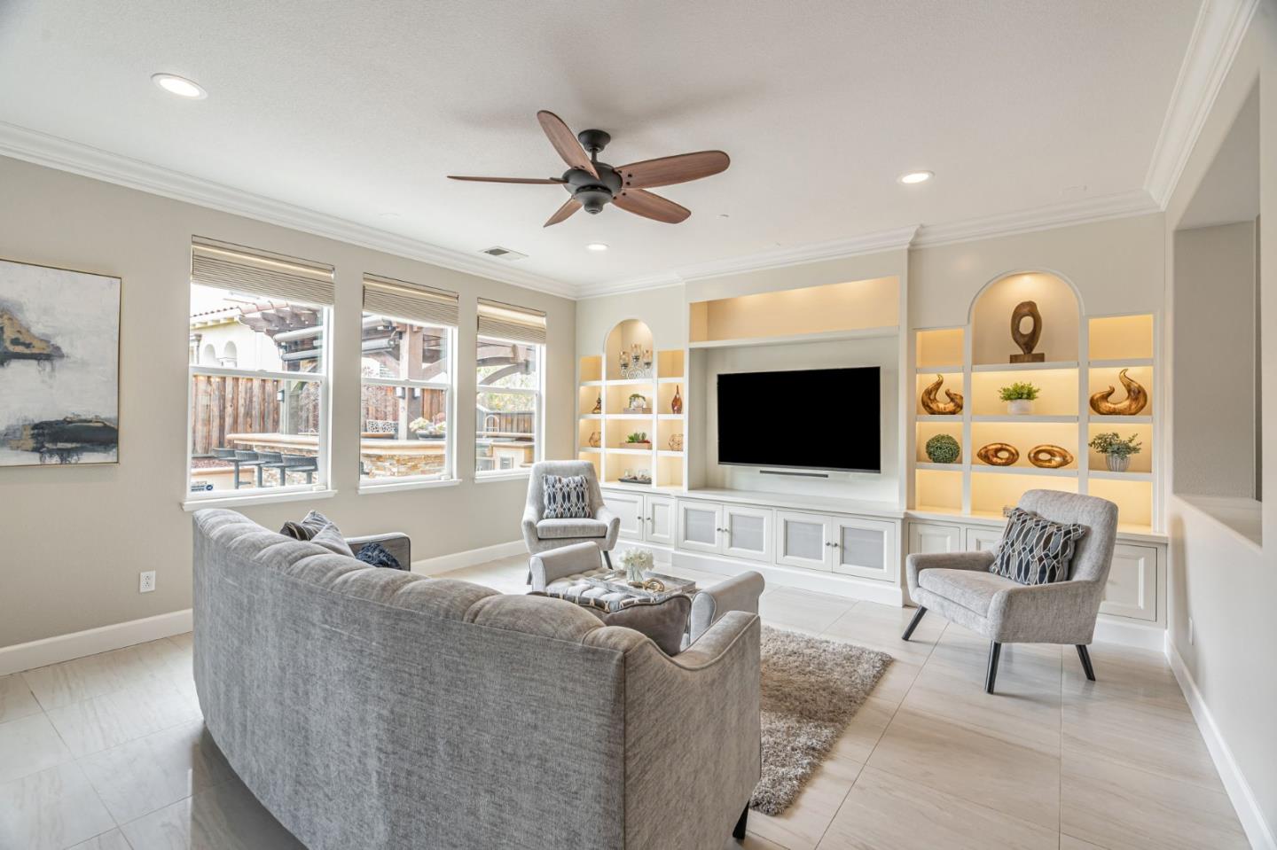6525 Gravina Loop San Jose, CA 95138 - Photo 13 of 63 a living room with furniture and a flat screen tv