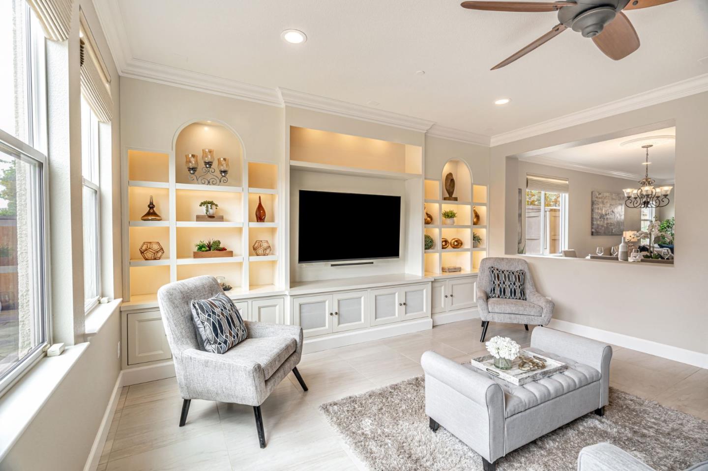 6525 Gravina Loop San Jose, CA 95138 - Photo 16 of 63 a living room with furniture fireplace and a flat screen tv