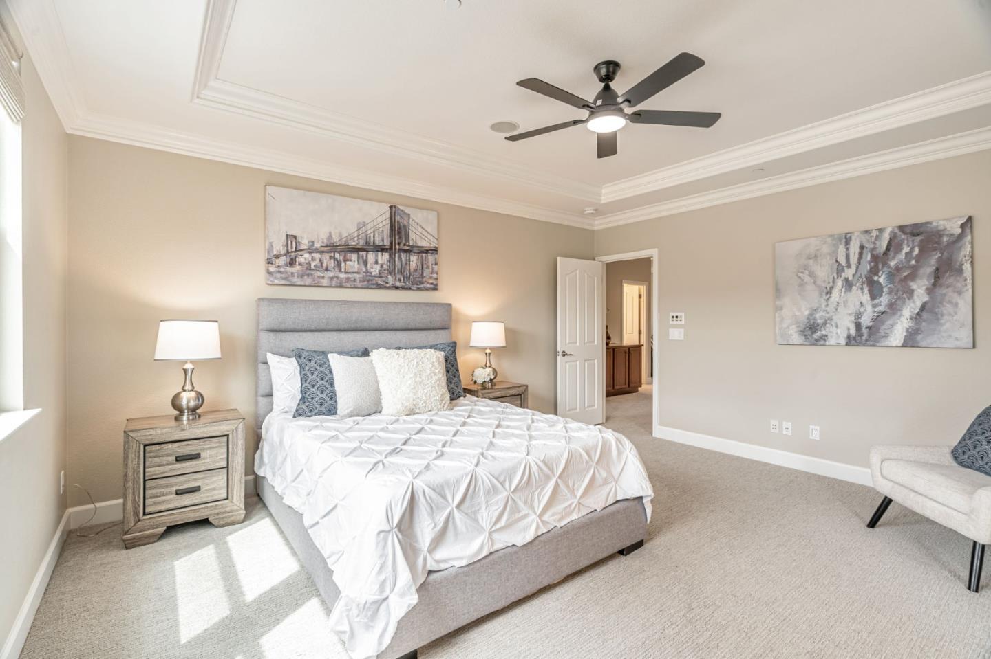 6525 Gravina Loop San Jose, CA 95138 - Photo 26 of 63 a bedroom with a bed and a ceiling fan