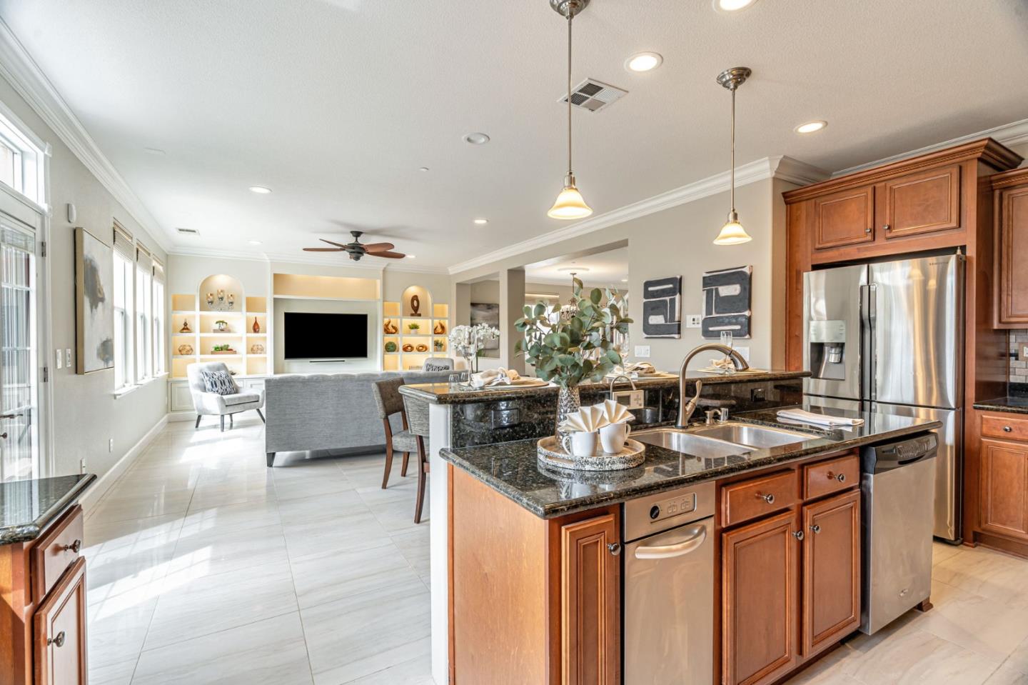6525 Gravina Loop San Jose, CA 95138 - Photo 3 of 63 a kitchen with stainless steel appliances granite countertop a sink a stove and a refrigerator