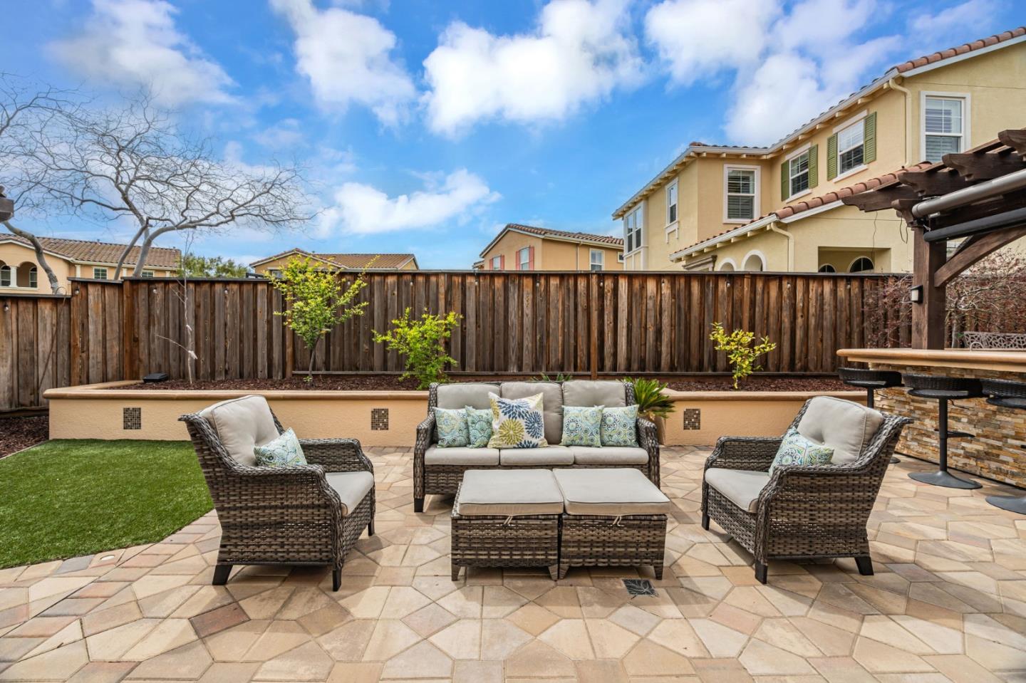 6525 Gravina Loop San Jose, CA 95138 - Photo 44 of 63 a view of a patio with couches chairs and a fire pit