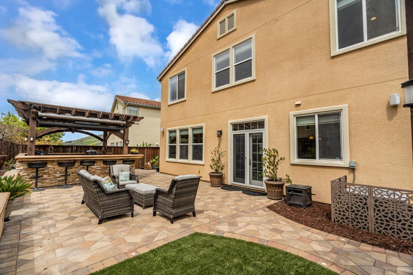 6525 Gravina Loop San Jose, CA 95138 - Photo 45 of 63 a roof deck with a table and chairs