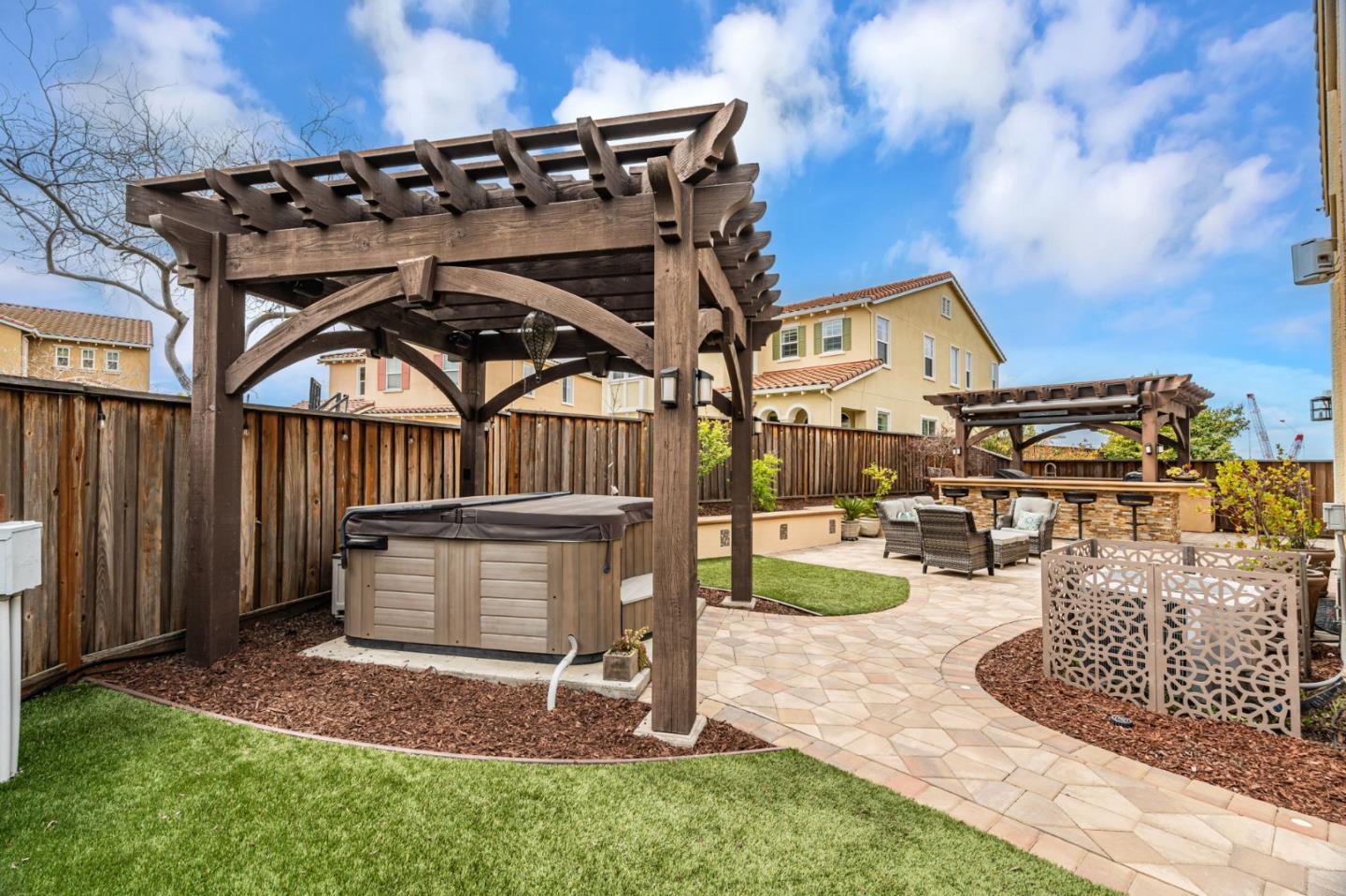 6525 Gravina Loop San Jose, CA 95138 - Photo 47 of 63 a view of a chair and table in backyard of the house