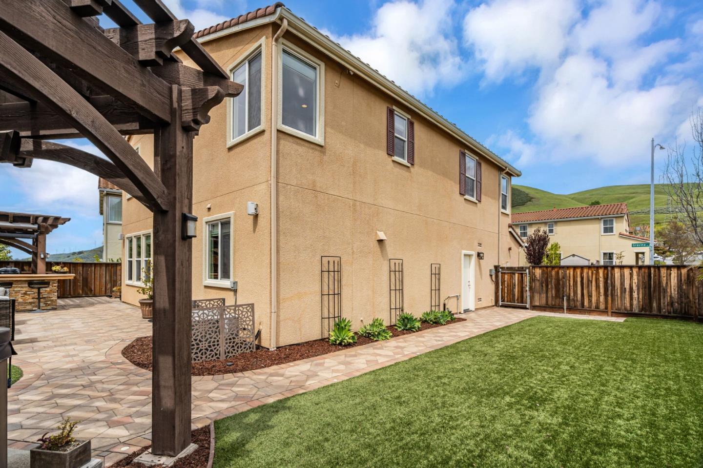 6525 Gravina Loop San Jose, CA 95138 - Photo 49 of 63 a view of a house with wooden fence